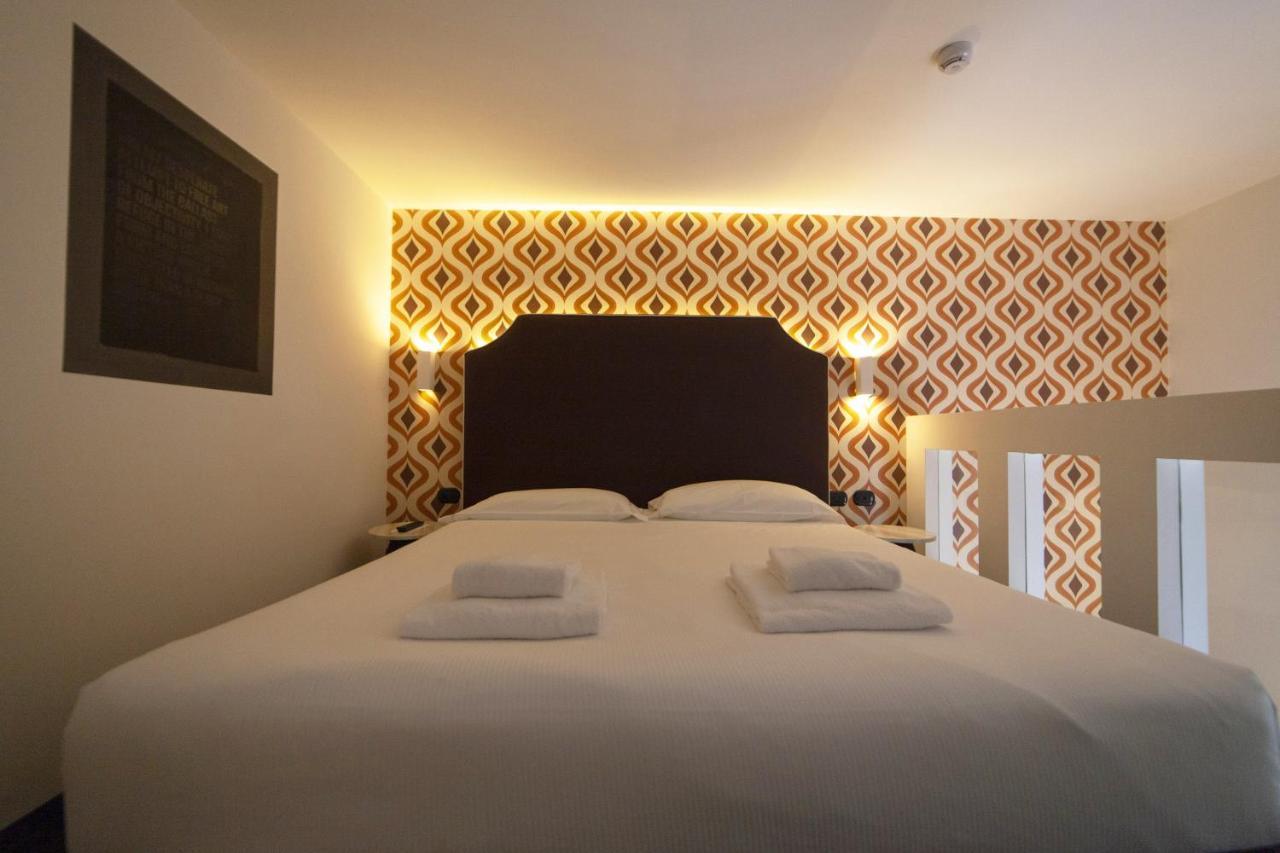 Hotel Al Campanile - Luxury Suites & Apartments Baveno Kültér fotó