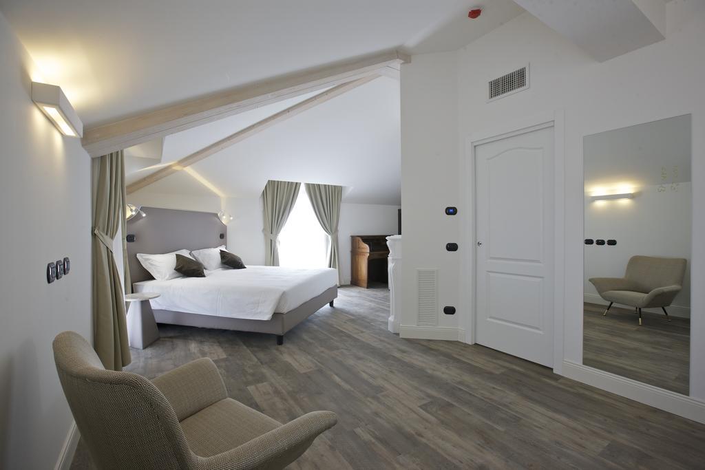 Hotel Al Campanile - Luxury Suites & Apartments Baveno Kültér fotó