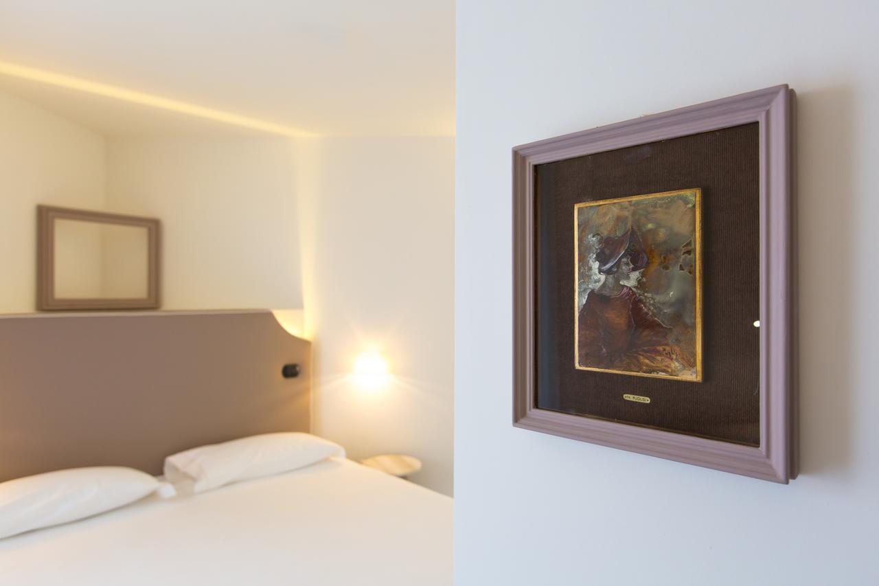 Hotel Al Campanile - Luxury Suites & Apartments Baveno Kültér fotó