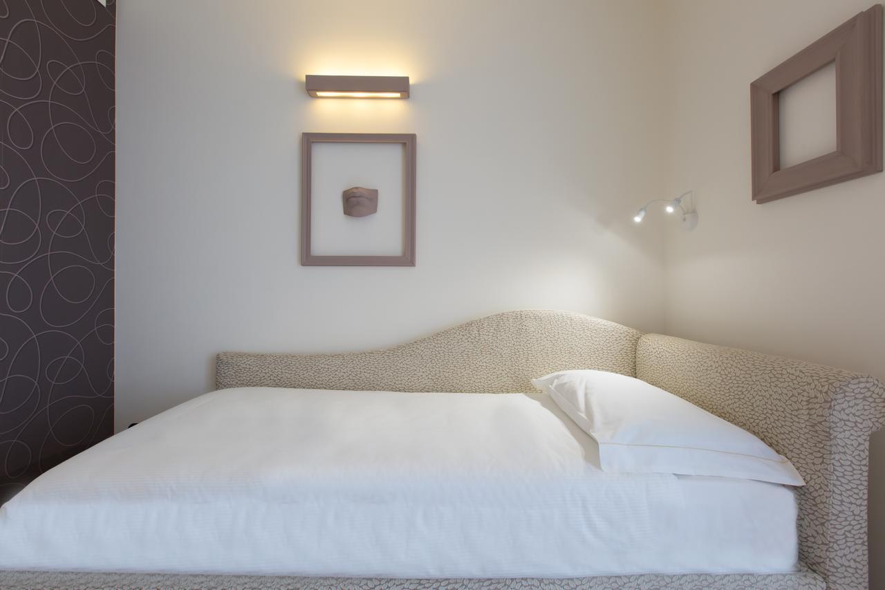 Hotel Al Campanile - Luxury Suites & Apartments Baveno Kültér fotó